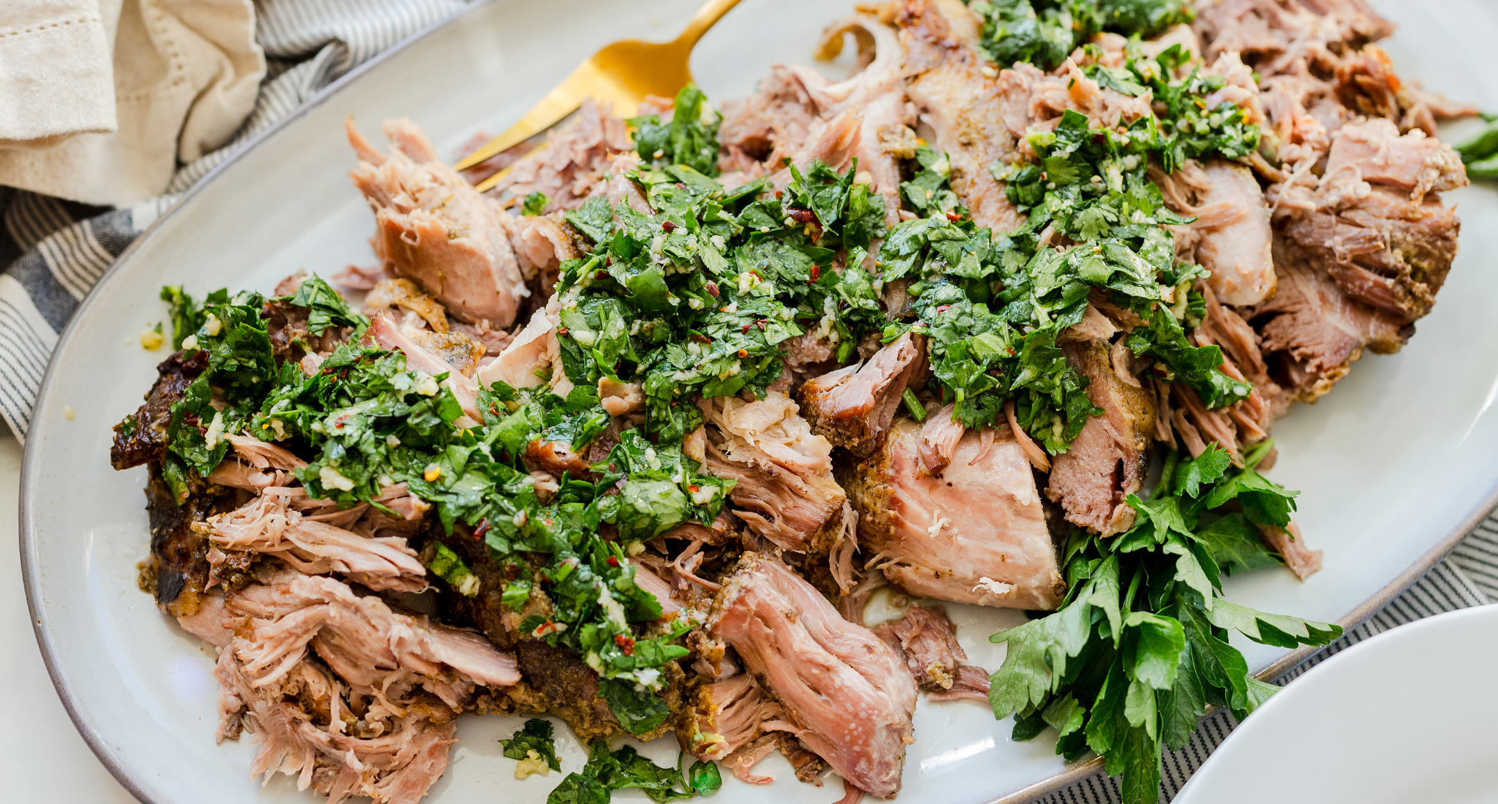 slow cooker pork shoulder with herbaceous sauce
