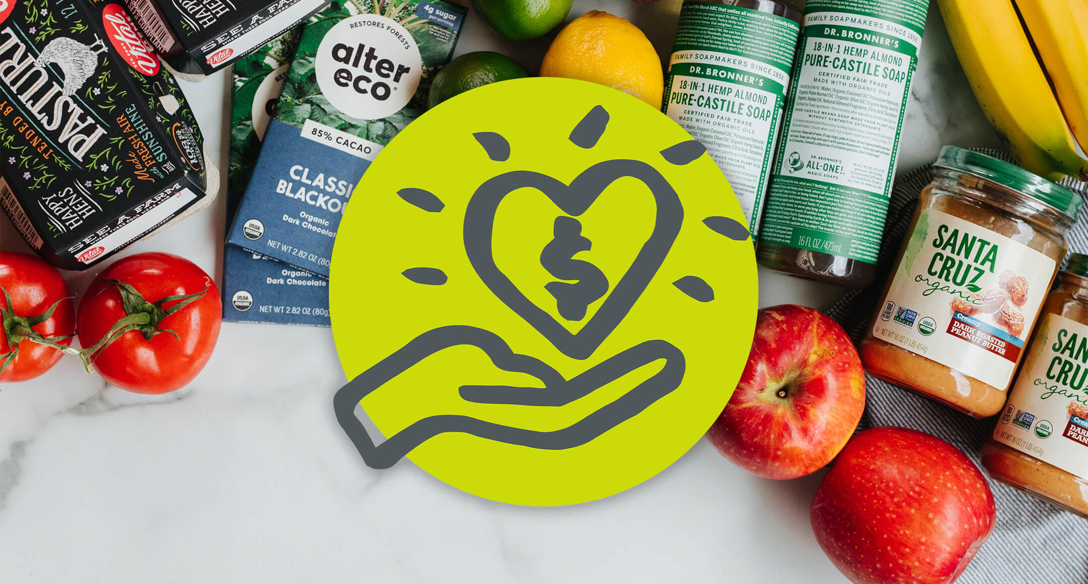 Illustrated Gift It! icon of a hand holding a heart overlayed on an image of a variety of New Seasons grocery items.